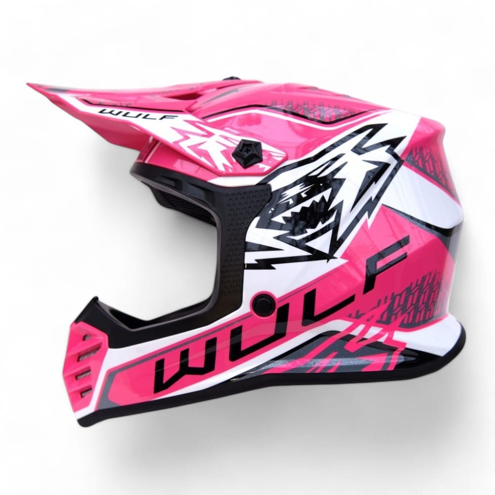 a pink and black Wulfsport motorcycle helmet
