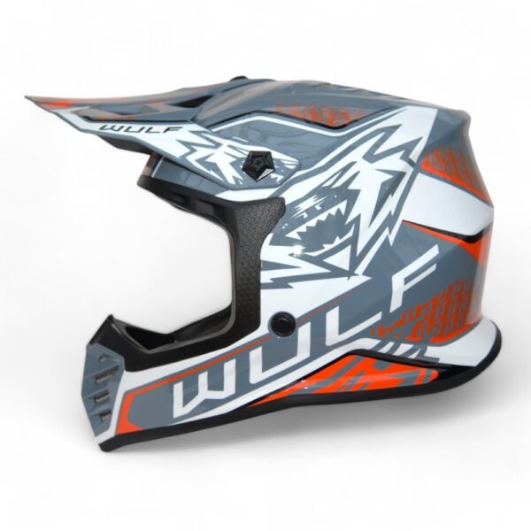 a Wulfsport helmet with a white and orange design