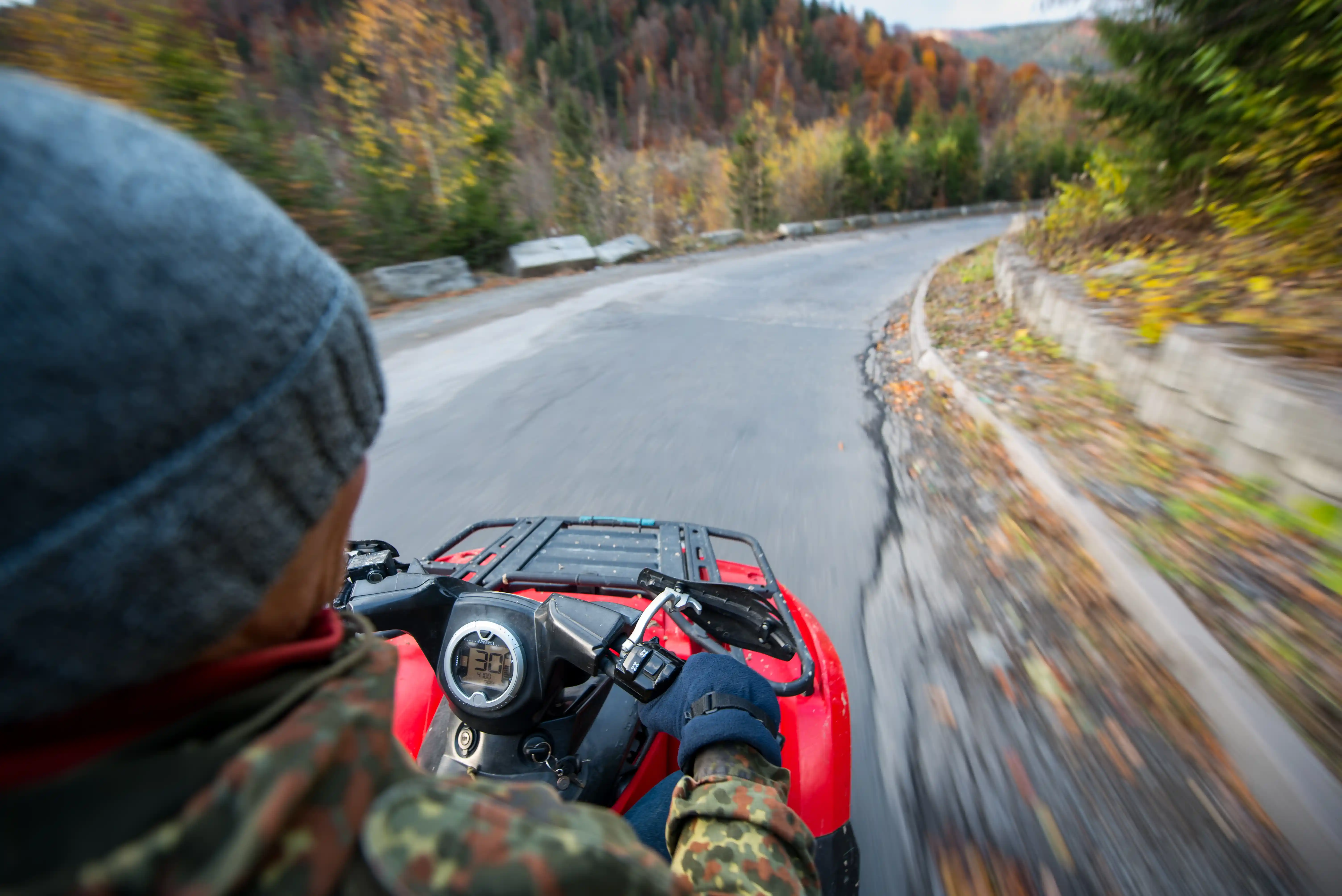 Driving an electric quad bike atv along a road