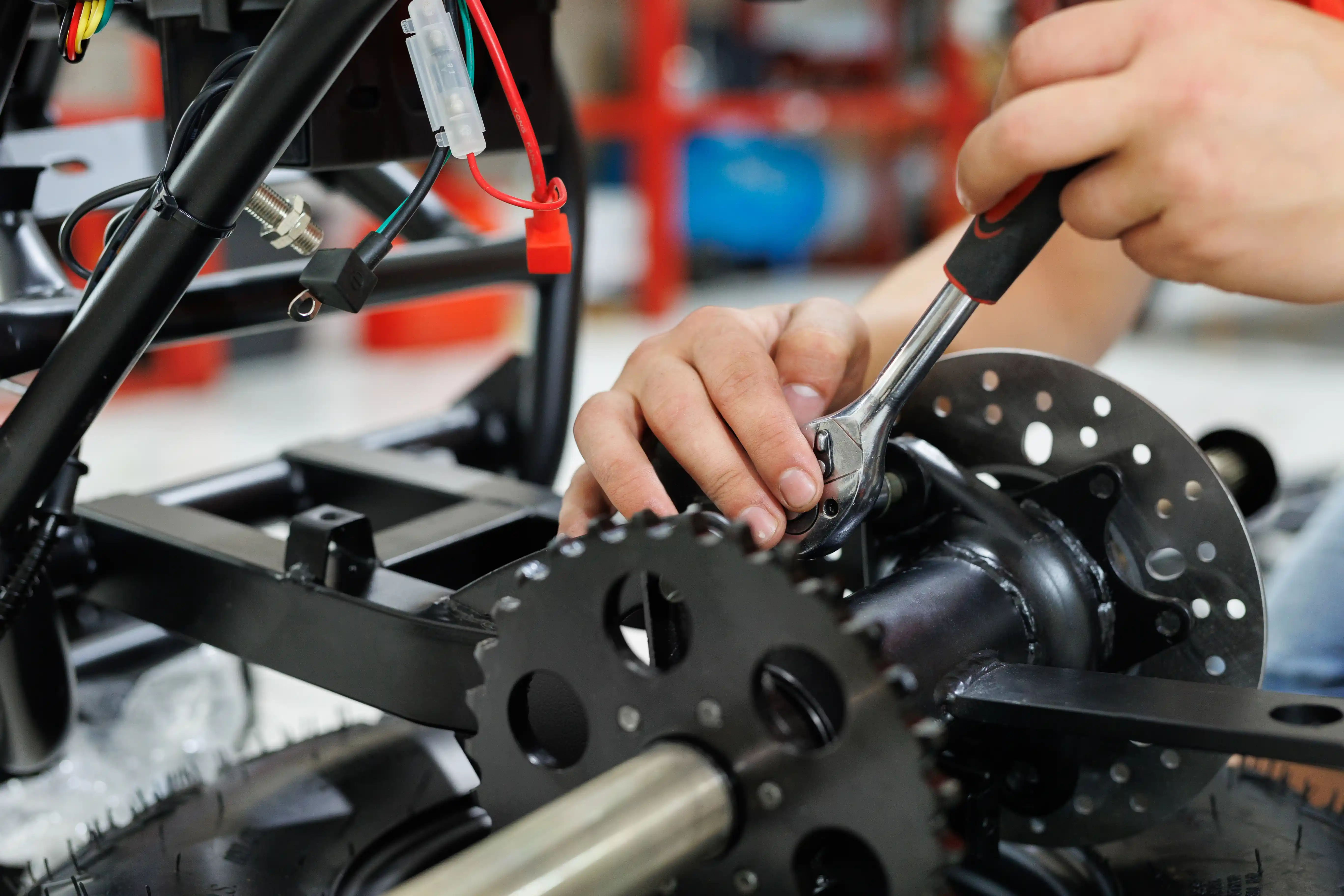 Electric quad bike maintenance in the workshop